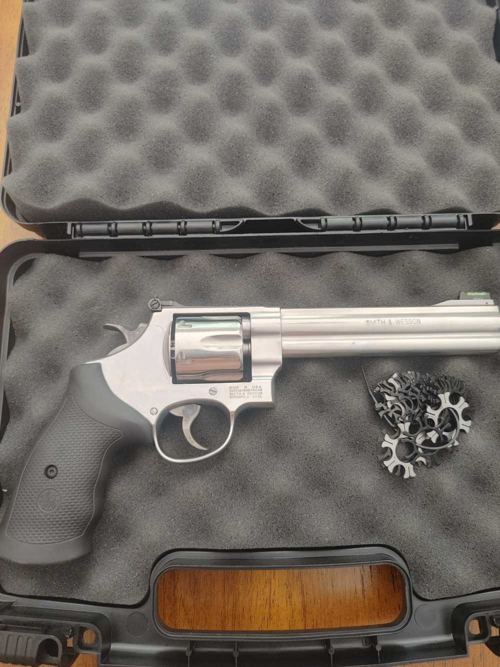 S&W 610 6" 10mm/40 Cal with 18 moon clips and aftermarket case.